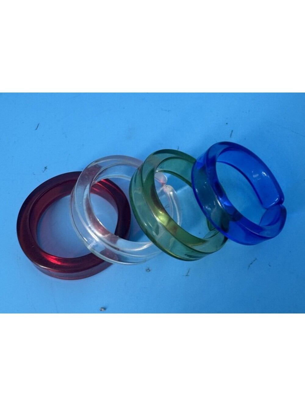 4 Vintage Acrylic Napkin Rings Lucite Style Red Blue Green Clear Circle Retro